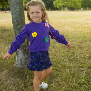 Bluza fioletowa z kwiatkami i falbankami na rękawkach